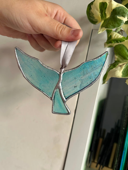 Iridescent whale tail