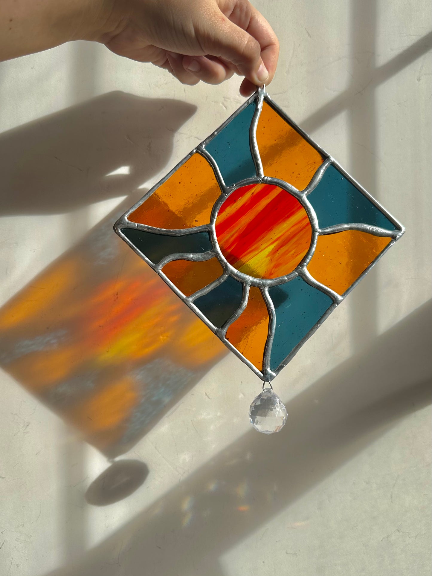 Iridescent blue and orange groovy sun