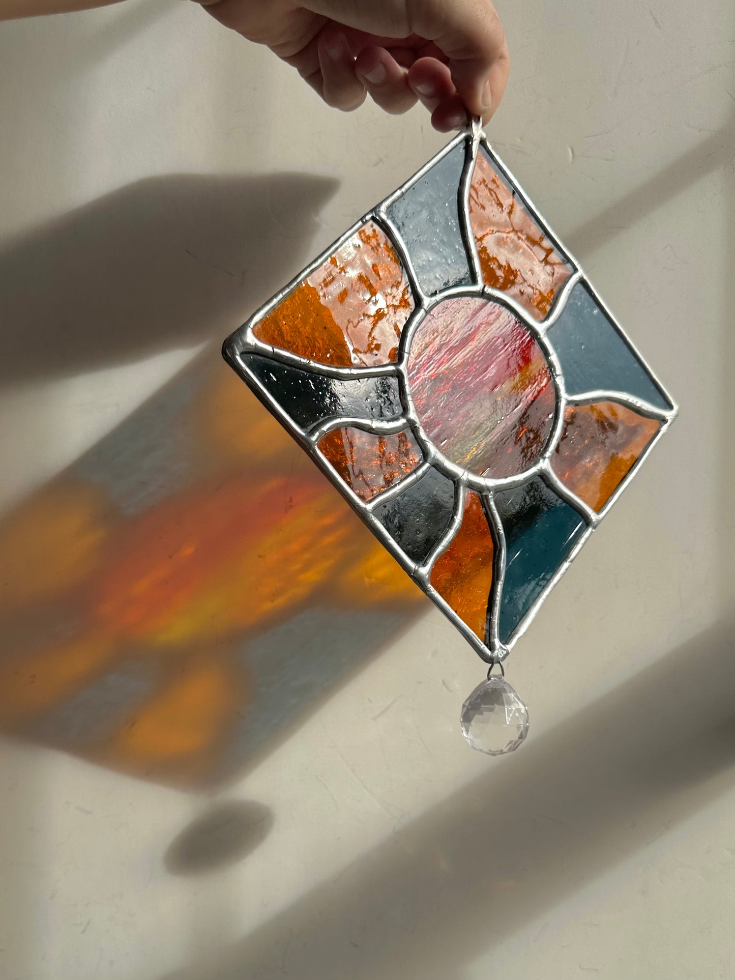 Iridescent blue and orange groovy sun