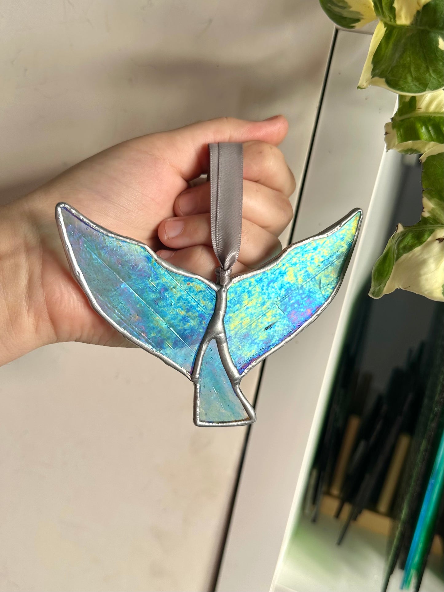 Iridescent whale tail