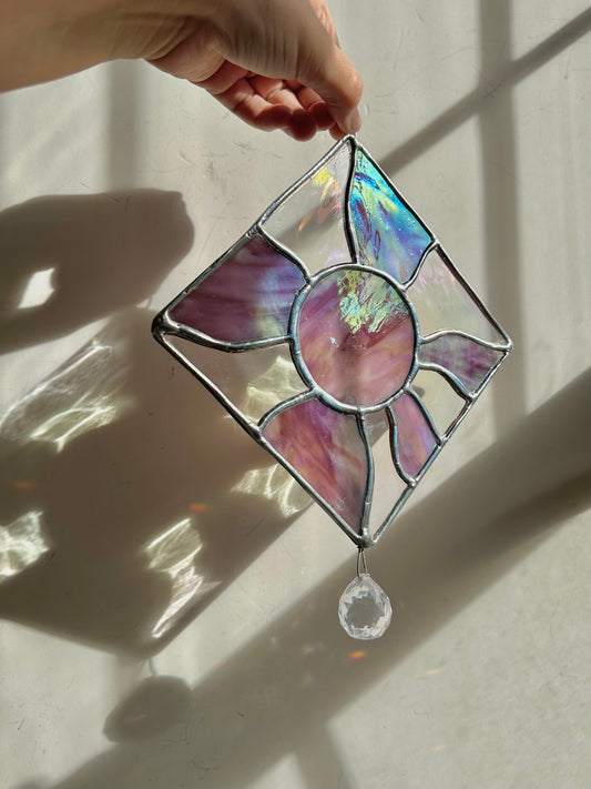 Iridescent purple groovy sun