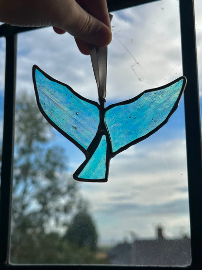 Iridescent whale tail